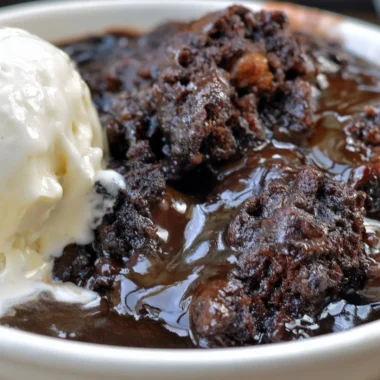 Delicious chocolate cobbler dessert made with cake mixes and rich chocolate flavor.