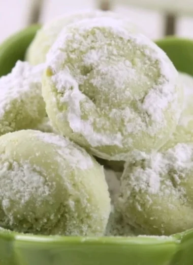 Delicious soft pistachio wedding cookies arranged on a festive platter