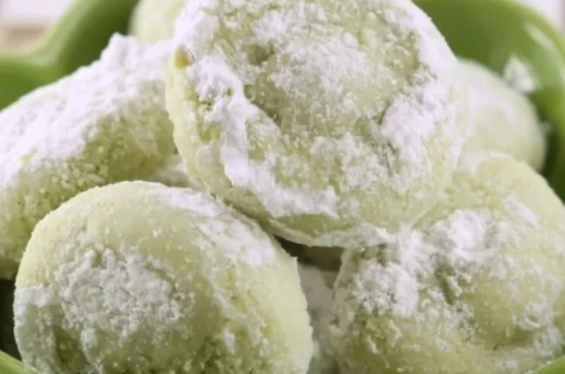 Delicious soft pistachio wedding cookies arranged on a festive platter